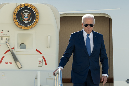 U.S. President Joe Biden deboards Air Force One upon arrival at John F. Kennedy International Airport in Queens, New York. President Biden travels to New York to attend three campaign events on Wednesday before returning to the White House.