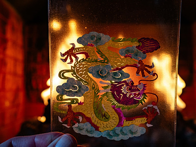 In this photo illustrations, a drawing of a traditional Chinese dragon is placed in front of a fireplace. The Lunar New Year, also known as the Spring Festival marks the beginning of the year according to the traditional Chinese lunar calendar. Traditionally, the dragon is an auspicious symbol of strength and power. It is also associated with good fortune, wisdom, success, protection, and masculinity.
