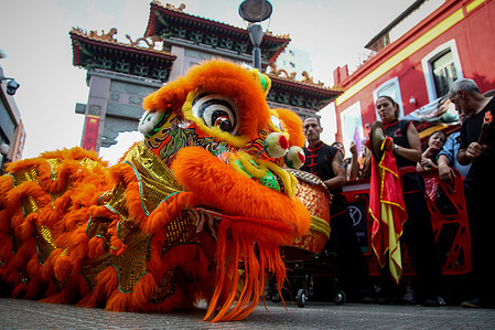 The performance of a dragon dance seen during the Chinese New Year celebration. People participate in the celebration of the Chinese New Year in the Chinatown of the city of Buenos Aires. The Chinese community of Argentina began the celebrations of the arrival of the "Wooden Dragon" by celebrating the New Year 4722.
