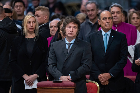 Argentina's President Javier Milei (C), flanked by his sister Karina Elizabeth Milei (L), attends the Holy Mass and canonization of Blessed Maria Antonia of Saint Joseph de Paz y Figueroa.