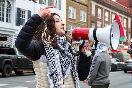 Penn State graduate student Roua Daas, an organizer with Students for Justice in Palestine, chants slogans during a pro-Palestinian rally at the Allen Street gates. The Penn State Students for Justice in Palestine and the Student Committee for Defense and Solidarity organized the “Hands Off Rafah” protest calling for an immediate ceasefire in Gaza following the Israeli attack on Rafah, a Palestinian city in the southern Gaza Strip.