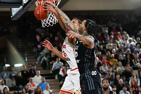 Asvel's Mike Scott #00 and Monaco's Petr Cornelie #12 are seen in action during the Coupe de France match between AS Monaco and LDLC ASVEL at the Salle Gaston-Medecin in Monaco. Final score: AS MONACO 92 - 82 LDLC ASVEL