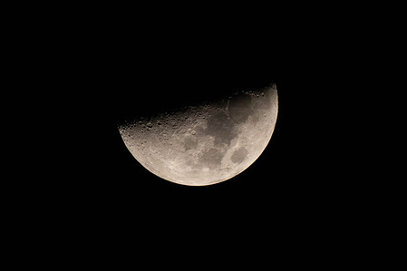The waxing crescent moon rises over the sky in Srinagar, the summer capital of Jammu and Kashmir.
