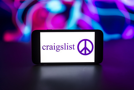 In this photo illustration, the craigslist logo is seen displayed on a mobile phone screen.