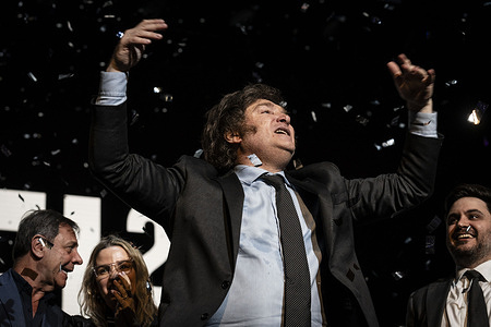 Javier Milei greets the audience after giving his speech during his campaign closing ceremony for the presidential elections in Argentina.