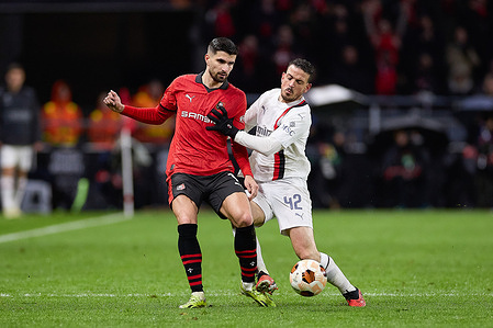 Martin Terrier of Stade Rennais FC (L) and Alessandro Florenzi of AC Milan (R) during the UEFA Europa League 2023/2024 Knockout Round Play-offs Second Leg match between Stade Rennais FC and AC Milan at Roazhon Park. Final score: Stade Rennais FC- AC Milan 3-2