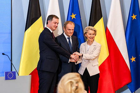 Polish Prime Minister Donald Tusk (C), the Prime Minister of Belgium Alexander De Croo (L), and the President of European Commission, Ursula von der Leyen (R) shake hands after trilateral talks at the PM's Chancellery on Ujazdowska Street. During the trilateral talks, the EU Commission announced its intention to release financial support from the European Union for Poland's National Reconstruction Plan. Additionally, discussions were held regarding European defense strategies in response to Russian aggression in Ukraine.