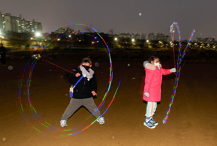 Children spin LED lights during an event marking the Jeongwol Daeboreum (The Great Full Moon Festival) at a riverside park in Seoul. Jeongwol Daeboreum is a Korean holiday that celebrates the first full moon of the Korean lunar new year, which is mostly based on the lunisolar calendar. This festival is the Korean version of the Great Full Moon Festival.