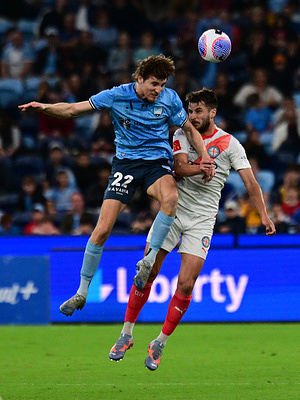Max Barry Burgess (L) of Sydney FC team and Lefteris Antonis (R) of Melbourne City FC are seen in action during the Men's A-League 2023/24 season round 18 match between Sydney FC and Melbourne City FC held at the Allianz Stadium. Final score; Sydney FC 1:1 Melbourne City FC.