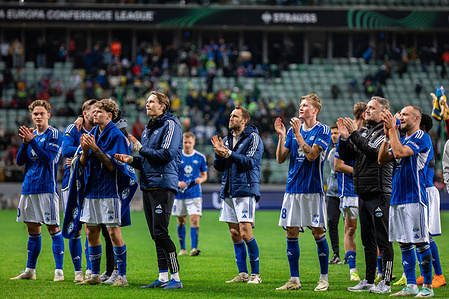 Team of Molde FK celebrates victory after the UEFA Europa Conference League knockout round play-off match between Legia Warszawa and Molde FK at Marshal Jozef Pilsudski Legia Warsaw Municipal Stadium. Final score; Legia Warszawa 0:3 Molde FK.