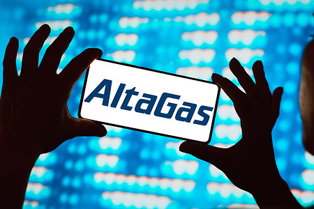 In this photo illustration, the AltaGas logo is displayed on a smartphone screen.