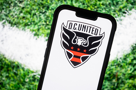 In this photo illustration, a D.C. United Football Club logo seen displayed on a smartphone.