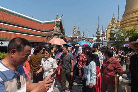 Tourists seen visiting the Temple of the Emerald Buddha in Bangkok. Thailand and China agreed to waive visa requirements for each other's nations with effect from March 1,2024 that's aimed to boost tourism between the two countries.
