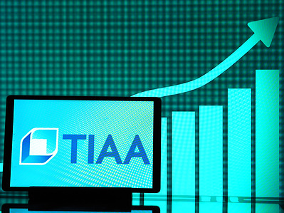 In this photo illustration, the Teachers Insurance and Annuity Association of America-College Retirement Equities Fund (TIAA, formerly TIAA-CREF) logo seen displayed on a tablet.