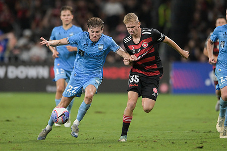 Max Barry Burgess (L) of Sydney FC team and Zachary Albert Sapsford (R) of Western Sydney Wanderers FC are seen in action during the Isuzu Ute A-League 2023/24 season round 19 match between Western Sydney Wanderers FC and Sydney FC held at the CommBank Stadium. Final score Sydney FC 4:1 Western Sydney Wanderers.