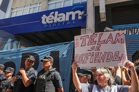 Police block the entrance to the state-run Telam news agency during the demonstration. President Javier Milei announced the closure of the Telam news agency on March 1. Telam, Argentina News Agency, was created in 1945 and is one of the most important news agencies in Latin America. It has representation and workers in the 24 provinces of Argentina and most media in Argentina work with pictures, videos, and information.