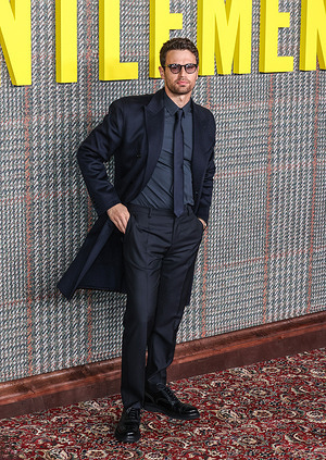 Theo James attends the UK Series Global Premiere of "The Gentlemen" at the Theatre Royal Drury Lane in London.