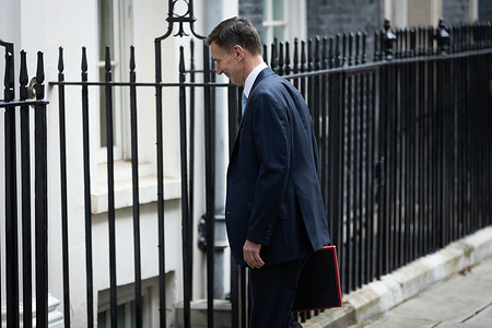 Chancellor of the Exchequer Jeremy Hunt, enters 11 Downing Street. Notable measures in today’s Budget were a 2p cut in National Insurance contributions and the abolition of the non-dom tax status for foreign nationals.