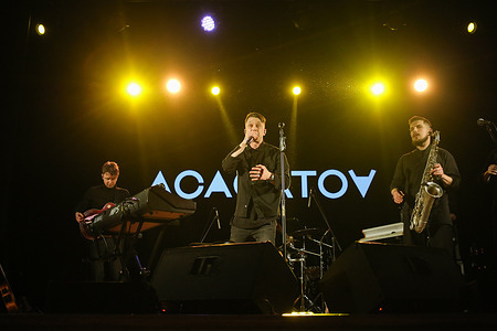 Asafatov group seen performing at the Union Cultural Center on Troitskaya Street.