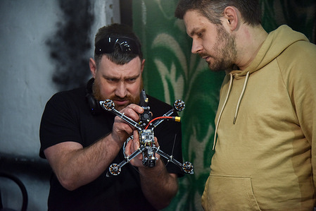 Men assemble First Person View (FPV) drones for the Ukrainian military. Volunteers Unite has started assembling First Person View (FPV) drones for the Ukrainian military in Lviv. People take special courses on how to assemble drones. They buy all components for drones with their funds and donations.