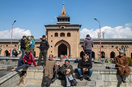 Kashmiri Muslims rest outside the Grand Mosque or Jamia Masjid on the first day of holy fasting month of Ramadan. Ramadan is the holiest month in Islam and the ninth month of islamic calendar. Muslims around the world celebrate the holy month of Ramadan by praying during the night time and abstaining from eating and drinking during the period between sunrise and sunset.