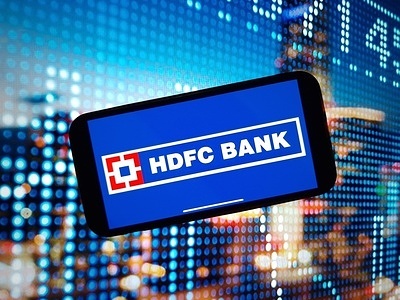 In this photo illustration, the HDFC Bank company logo is seen displayed on a smartphone screen.