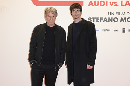 Renato De Maria (L) and Giovanni Demaria (R) attend the red carpet of the premiere of the film "Race for Glory" at The Space Cinema Moderno.