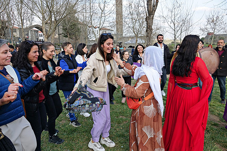 A young Kurdish girl is seen dancing with her mother during the propaganda activities of the People's Equality and Democracy Party. The People's Equality and Democracy Party (DEM Party), supported by the majority of Kurds living in Turkey, continues its propaganda efforts for the March 31 municipal elections in the city of Diyarbakir. DEM Party is the 3rd largest party in Turkey.