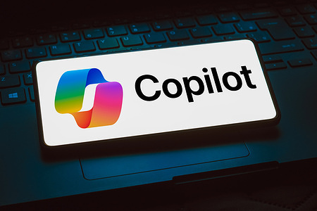 In this photo illustration, the Microsoft Copilot logo is displayed on a smartphone screen.