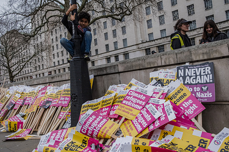 The anti-racism placards were left outside 10 Downing Street after the demonstration. Various anti-racism groups gathered in central London for a 'Stop The Hate' demonstration. They marched through Westminster and Whitehall to Downing Street, while chanting slogans like “Stop the racists. Stop the hate” and “Refugees are welcome here”.