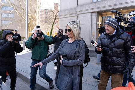 Nadine Arslanian Menendez reaches for the car door as press take photos after leaving federal court for a conflict of interest hearing regarding her lawyer David Schertler. Damian Williams called the special hearing as Schertler could be brought to the stand. Bob Menendez and co-defendants are facing a new superseding indictment and expanded charges from four counts to 18, including conspiracy to obstruct justice and obstruction of justice.