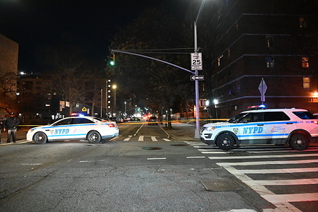 Police vehicles and police officers block roads and close off streets following a shooting that left two people dead in Manhattan, New York Sunday evening. Two people dead after a shooting in Manhattan, New York, United States on March 24, 2024. Sunday, March 24, 2024, at approximately 7:27 PM, in the vicinity of East 128 Street and Lexington Avenue, police responded to 911 calls of shooting at the location and upon arrival, police observed 18-year-old female, Ashley Ballard with gunshot wounds to the back and head and 25-year-old male, Harry Mendoza with gunshot wounds to the head. Both the male and female were pronounced dead at the hospital. There are no arrests and the investigation remains ongoing.