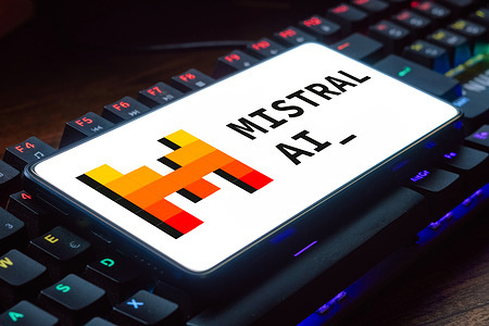 In this photo illustration, the Mistral AI logo is displayed on a smartphone screen.