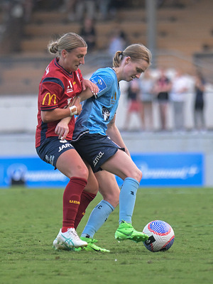 Meleri Mullan (L) of Adelaide United and Abbey Rae Lemon (R) of Sydney FC are seen in action during the Liberty A-League 2023-24 season round 21 match between Sydney FC and Adelaide United held at the Leichhardt Oval. Final score; Sydney FC 3:0 Adelaide United.