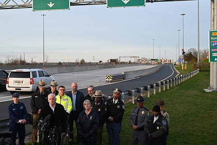Officials hold a press conference at the site of the collapse of the Francis Scott Key Bridge in Baltimore, Maryland. Collapse of the Francis Scott Key Bridge in Baltimore, Maryland, United States on March 26, 2024. Tuesday morning, a container ship struck the Francis Scott Key Bridge in Baltimore, Maryland causing the bridge to collapse. Vehicles are reportedly submerged in the water as well as several people reportedly who fell in to the water below the bridge when it collapsed.