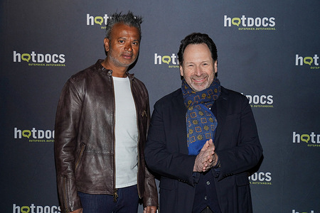 Sash Simpson and Barry Avrich attend Hot Docs Film Festival press conference for their film, "Born Hungry".
An inspiring true story brought to life "Born Hungry" is a gritty yet life-affirming human drama about a young Indian boy who finds himself abandoned by his family lost on trains and thousands of miles from home. Now Sash a celebrity chef who once survived alone on the streets of Chennai eating from garbage bins before ultimately being adopted by a Canadian couple returns to India armed with only blurry memories to find his lost family. "Born Hungry" is a raw true and important story with a huge heart that deals with identity and cultural heritage.