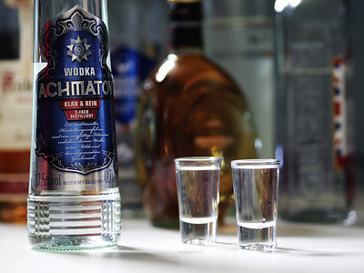 In this photo illustration, a bottle of Achmatov Vodka seen displayed on a table.