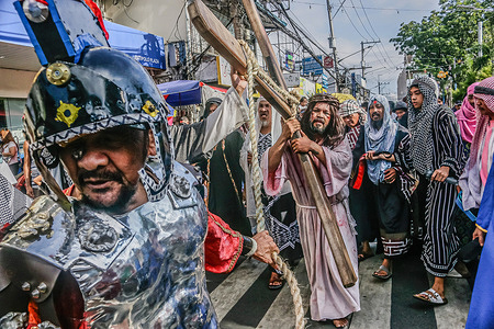 Actors playing as Jesus Christ, soldiers, and apostles are seen during the Senakulo along the streets in Antipolo City. Actors reenacts the "Senakulo" or the Passion of Christ along the streets of Antipolo City, portraying the sufferings of Jesus. The Senakulo is a poignant dramatic portrayal of the life, suffering, death, and resurrection of Jesus Christ. It is also referred to as the passion play or cenaculo.