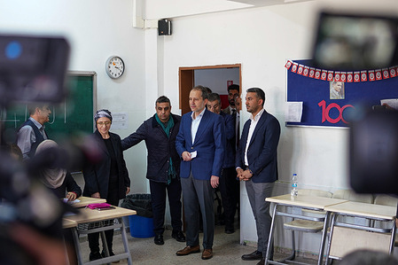 New Welfare Party (YRP) Chairman Fatih Erbakan, waits for his turn to vote with citizens. In the 31 March 2024 Local Government General Elections held in Turkey, New Welfare Party (YRP) Chairman Dr. Fatih Erbakan cast his vote at Rıdvan Ege Anatolian High School.