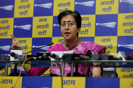 Aam Aadmi Party (AAP) leader and Delhi Education Minister, Atishi Singh addresses a press conference at Party Office, in New Delhi. Atishi said "Bharatiya Janata Party (BJP) through one of my close aides approached me to join BJP party to save my political career and If I do not join the BJP then in the coming one month I will be arrested by Enforcement Directorate (ED)."