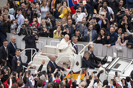 Pope Francis, seen on the Popemobile car greeting pilgrims in St. Peter's Square at the end of the Easter Holy Mass. Pope Francis presides over the Easter Holy Mass in St. Peter's Square in Vatican City on March 31, 2024. Christians around the world are marking the Holy Week, commemorating the crucifixion of Jesus Christ, leading up to his resurrection on Easter.