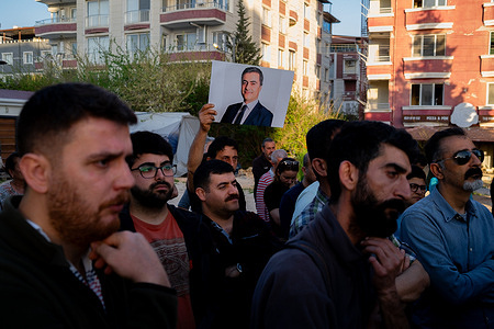 A Peoples' Equality and Democracy Party (DEM) supporter carries a portrait of Abdullah Zeydan during the demonstration. Supporters of Abdullah Zeydan, from the DEM Party, rallied to protest the decision of the Van provincial electoral board in eastern Turkey. The board revoked Zeydan's victory in the mayoral elections, disqualifying him from holding office and handing the metropolitan municipality to the candidate from the ruling Justice and Development Party (AKP). Zeydan, along with his running mate Neslihan Şedal, had secured a commanding victory in the Van metropolitan municipality, earning 55.48% of the votes. In contrast, the AKP candidate received only 27.15% of the votes.