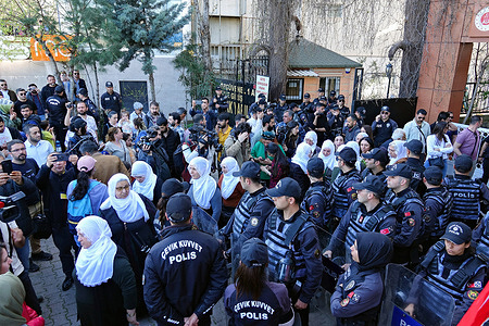 A group of Kurdish peace mothers take part during the protest as police officers block the way in front of the Provincial Election Board. Executives, deputies, and supporters of the People's Equality and Democracy Party (DEM Party), along with the Democratic Regions Party (DBP), gathered to protest in front of the Provincial Election Board building in Diyarbakır. They expressed their disappointment with the Electoral Board's decision to cancel the right to be elected of the Metropolitan Mayor candidate of the DEM Party, Abdullah Zeydan. Zeydan had won the local elections in Van with 55 percent of the votes. However, the mayoral certificate was given to Abdullah Arvas, the candidate of the ruling Justice and Development Party (AK Party), who had finished second with 27 percent of the votes.