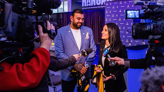 (L-R) Ravinder Minhas and Manjit Minhas speak to the Press after the announcement adding them to the Stinger's Ownership Group. The Stingers have welcomed Ravinder Minhas and Manjit Minhas, owners of Minhas Distillery, Winery & Brewery (also from CBC's Dragon's Den), into the ownership group of the Edmonton Stingers. They chose Edmonton over Calgary due to the strong support they've received from Albertans in Edmonton and the North, aiming to give back to those who have supported them from the beginning, prioritizing their fellow Albertans.