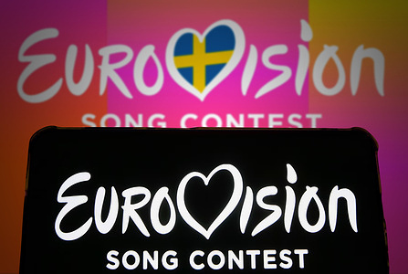 In this photo illustration, Eurovision Song Contest 2024 (ESC) logo is seen on a smartphone and a pc screen. The Eurovision Song Contest 2024 is scheduled to take place in May 2024 in Malmo Sweden.