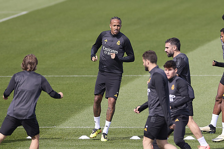 Eder Militao of Real Madrid CF warms up during the training session on the eve of the UEFA Champions League 2023/2024 quarter-finals first leg football match between Real Madrid CF and Manchester City at Real Madrid training ground