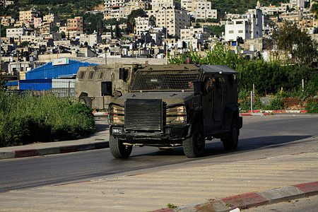 Israeli military vehicles patrol the Balata refugee camp, during a military operation to arrest the wanted Palestinians east of Nablus in the occupied West Bank.