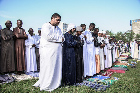 Muslims offer morning prayers on Eid al Fitr which marks the end of the holy fasting month of Ramadan at Menengai High School Grounds in Nakuru City.