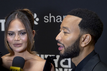 (L-R) Chrissy Teigen and John Legend attend the 2024 City Harvest Gala at Cipriani 42nd Street in New York City.