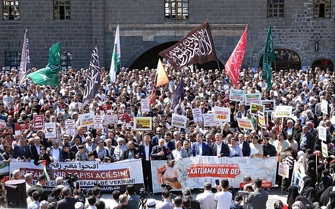 Protesters hold banners and placards during the demonstration. The death of 3 sons and 4 grandsons of Ismail Haniyeh Chief of the Political Bureau of the Hamas organization, in an Israeli attack was protested in Diyarbakir, Turkey, after Friday prayers, with a demonstration attended by hundreds of people. Funeral prayers were performed and prayers were said for the dead.